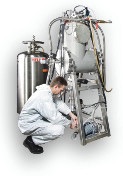 Engineer servicing a Tesla superconducting magnet